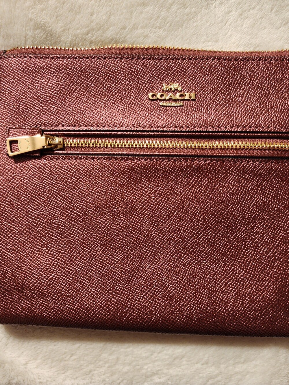 COACH Metallic Rose Gold Zip Wristlet